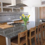 winter is the living area in our luxury vacation rental house in Burgundy (Puligny Montrachet) with well a fantastic kitchen space